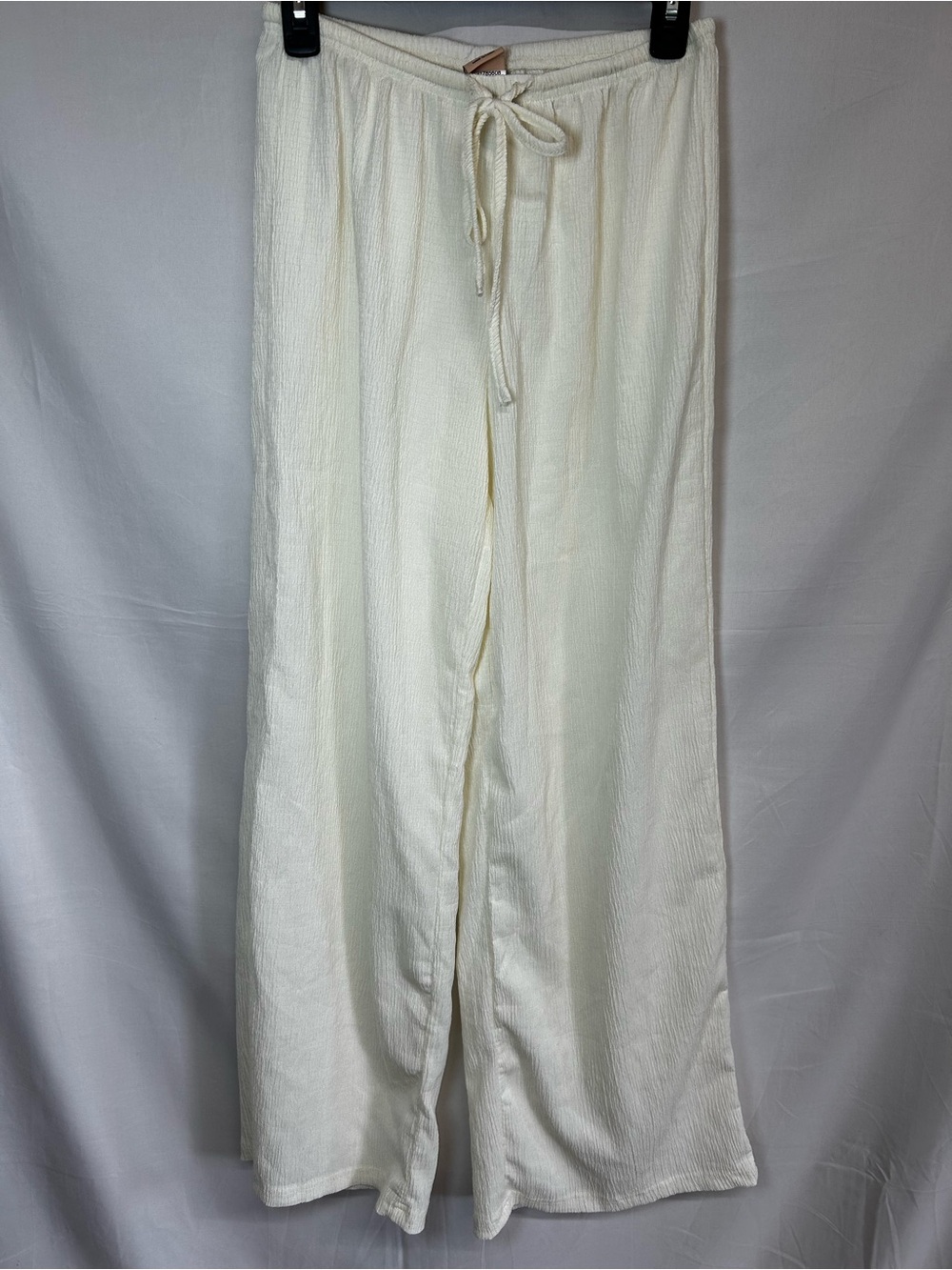 Forever 21 cream colored XS modern textured wide leg pants